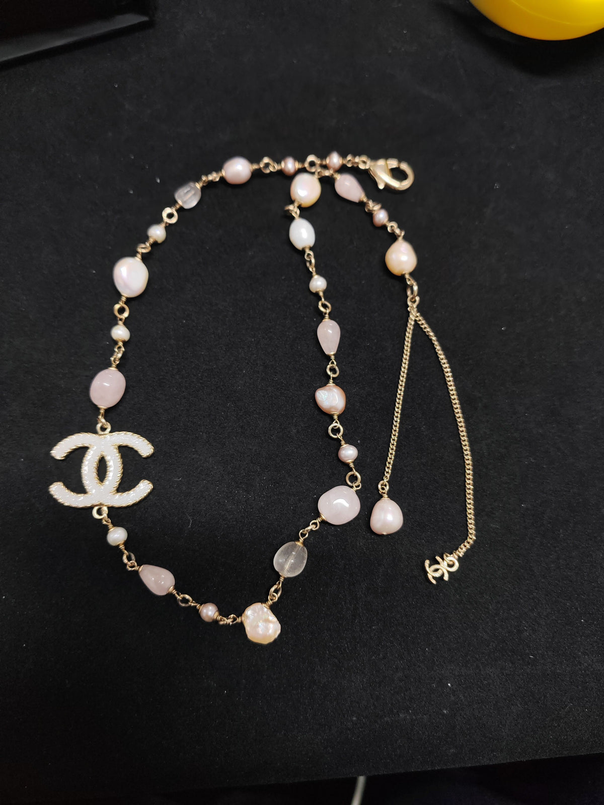 Chanel - Other - Gold-tone metal with pearl-like and pink beads. - Multicolour