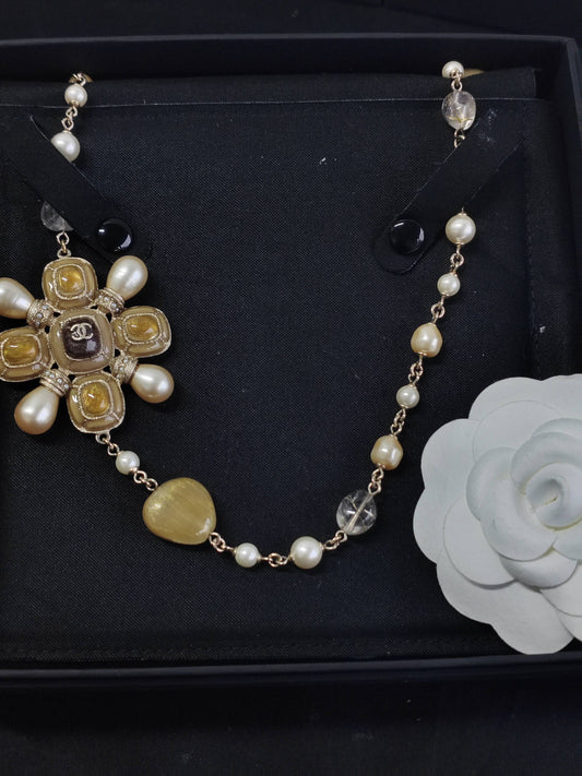 Chanel - Other - Gold-tone metal with pearl-like beads and assorted decorative stones; exact stone composition unknown. - Multicolour