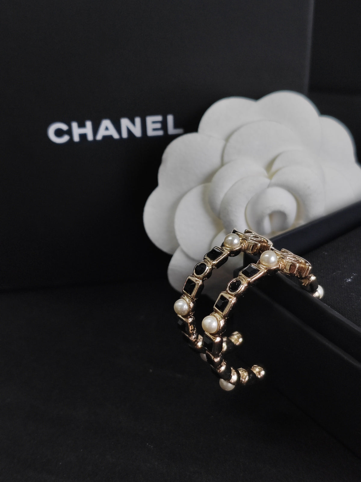 Chanel - Other - Gold-tone metal with pearl-like beads and black faceted stones; exact bead and stone composition is unknown. - Gold
