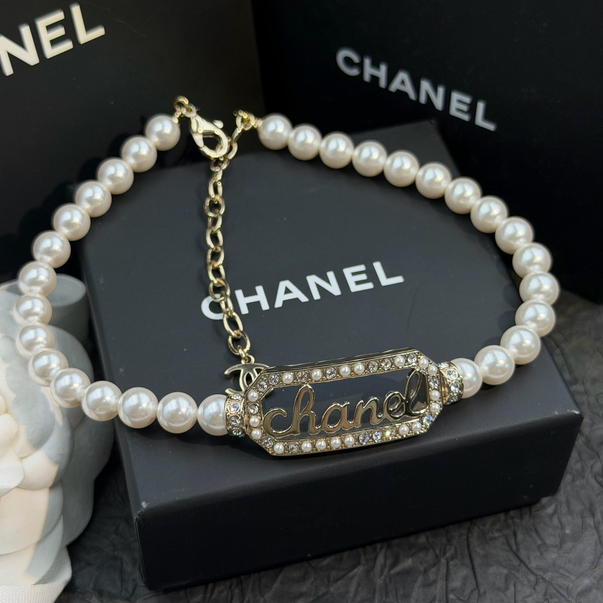 Chanel - Other - Gold-tone metal with pearl-like beads and crystal embellishments. - White