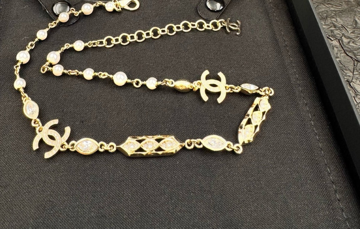Chanel - Other - Gold-tone metal with pearl-style beads and clear crystal accents - Gold - (38+7 cm)