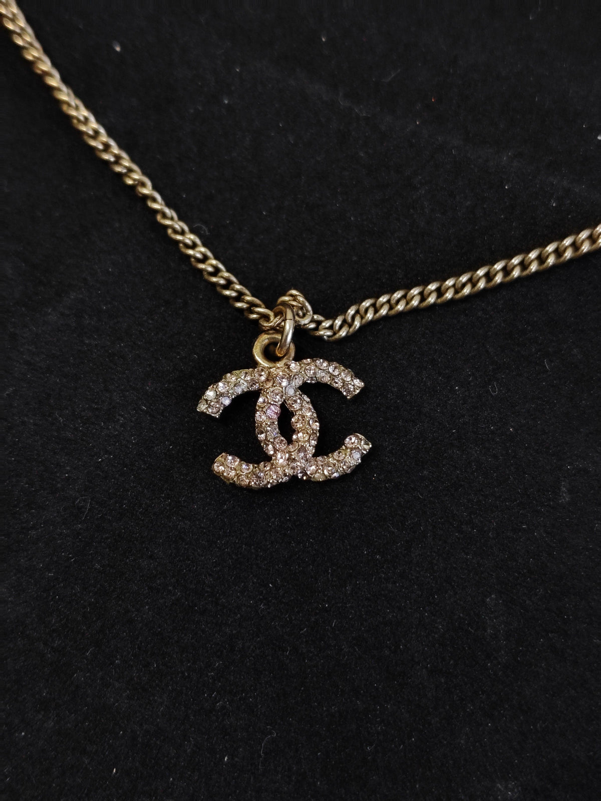 Chanel - Other - Gold-tone metal with purple glass beads and clear rhinestone embellishment; composition not verified. - Multicolour