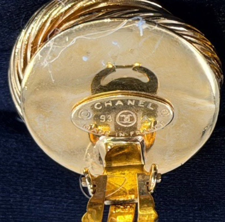 Chanel - Other - Gold-tone metal with red glass cabochons and clear rhinestone accents; exact metal composition is unconfirmed. - Multicolour