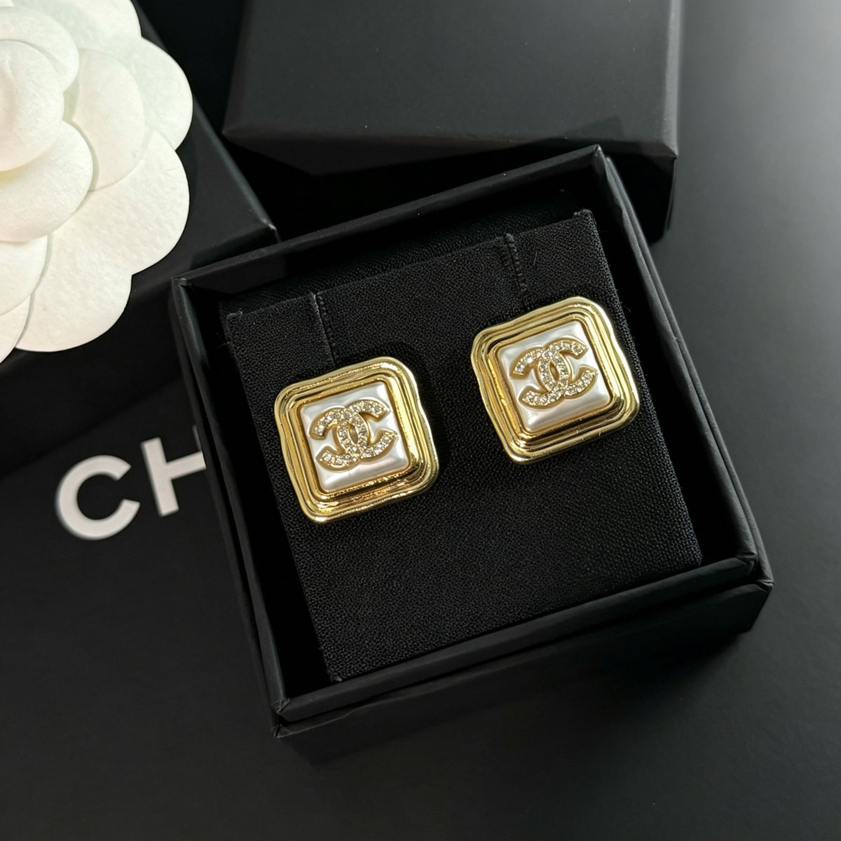 Chanel - Other - Gold-tone metal with rhinestone embellishments; the white inset material is unconfirmed. - Gold