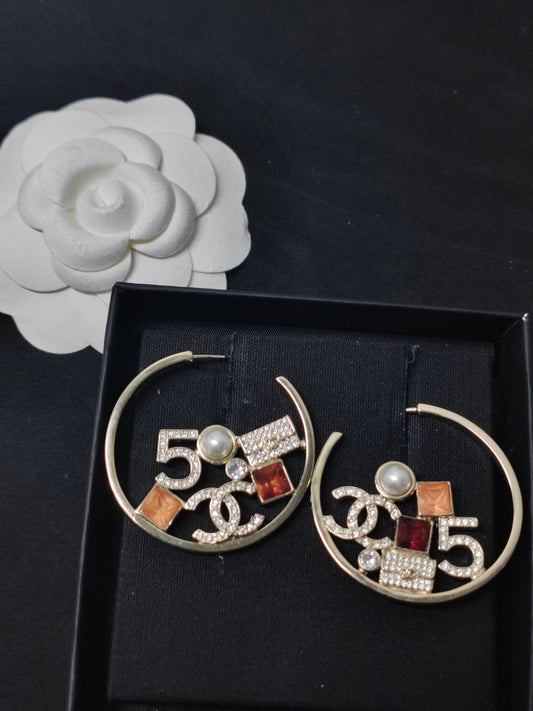 Chanel - Other - Gold-tone metal with rhinestone-like, faux-pearl-like and colored decorative accents. - Multicolour