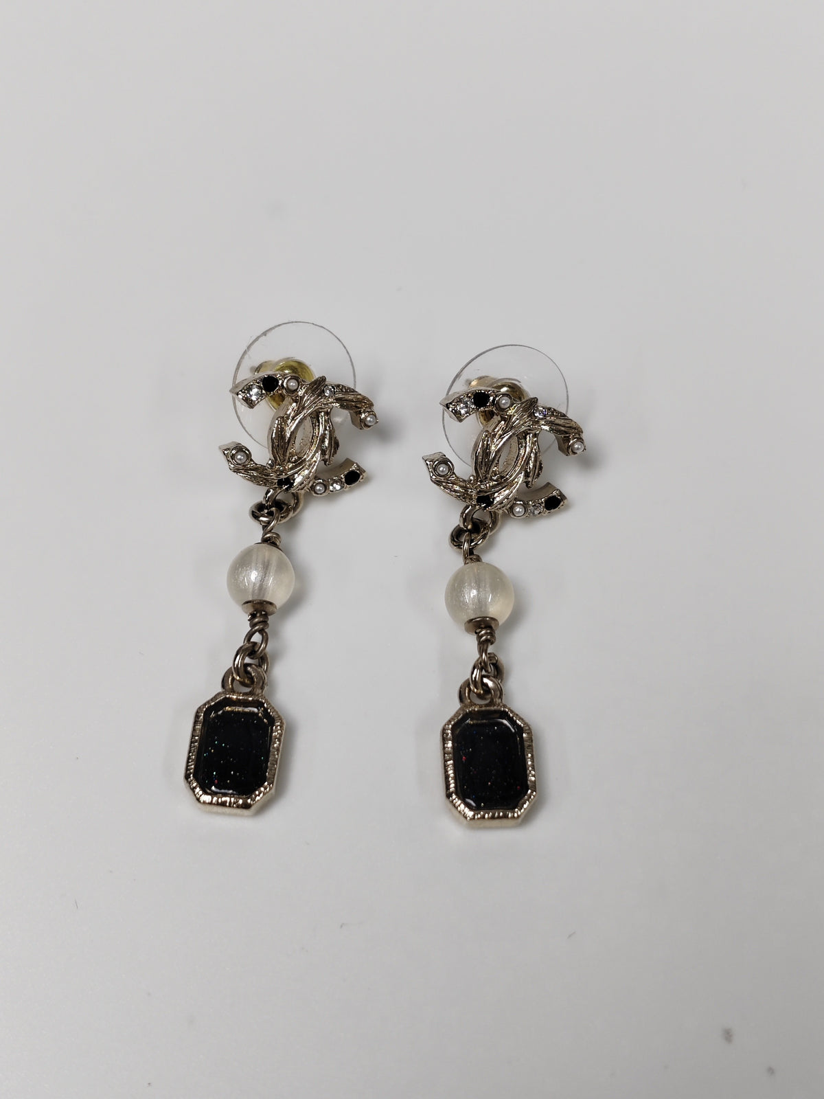 Chanel - Other - Gold-tone metal with rhinestone-style stones and pearl-like and black decorative elements; exact stone and pearl composition is not confirmed. - Multicolour