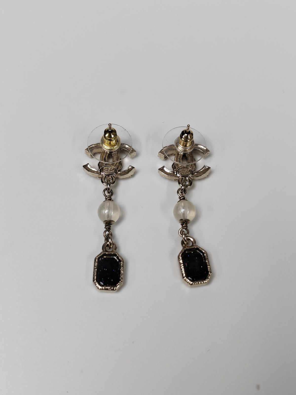 Chanel - Other - Gold-tone metal with rhinestone-style stones and pearl-like and black decorative elements; exact stone and pearl composition is not confirmed. - Multicolour