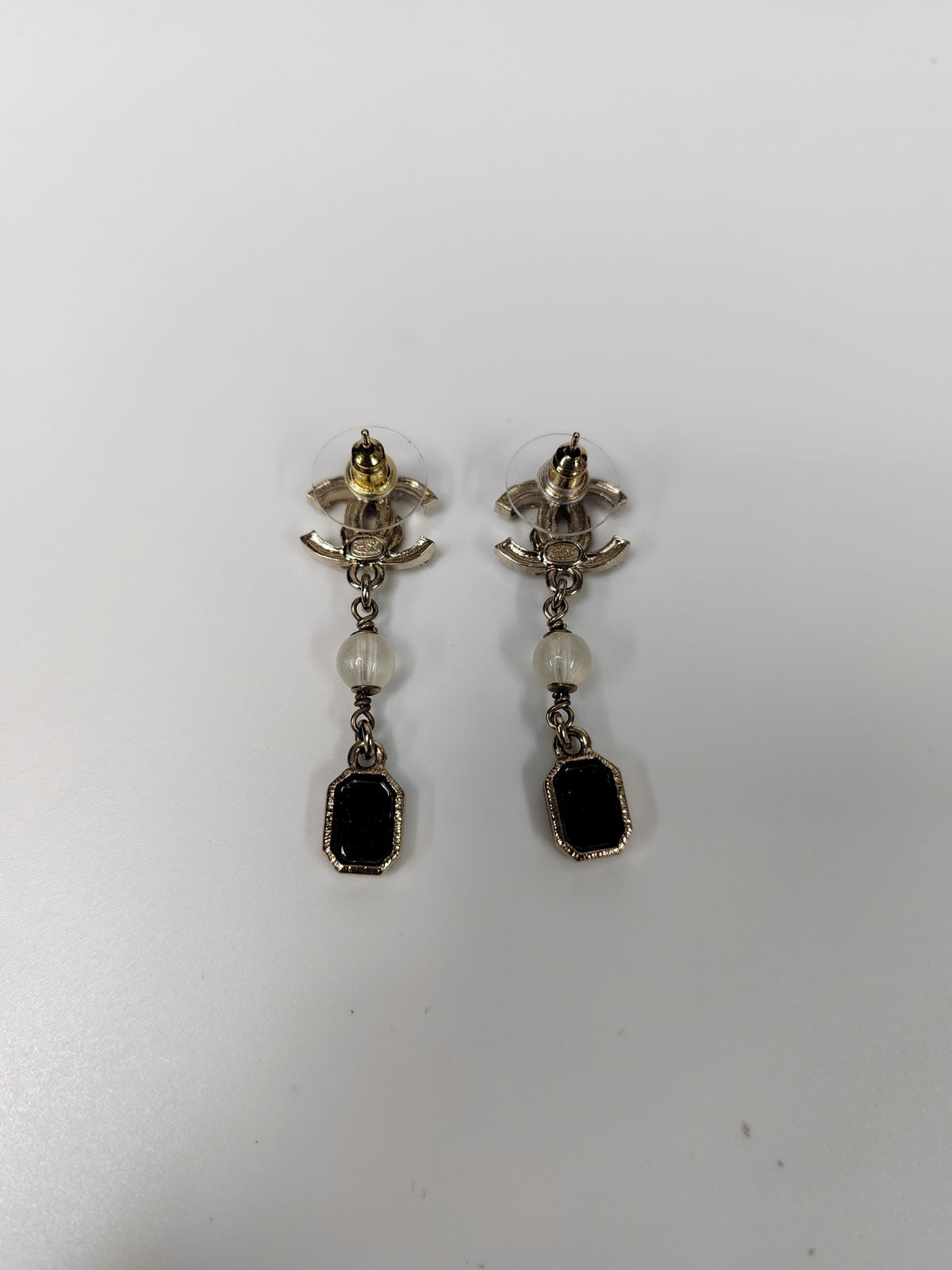 Chanel - Other - Gold-tone metal with rhinestone-style stones and pearl-like and black decorative elements; exact stone and pearl composition is not confirmed. - Multicolour