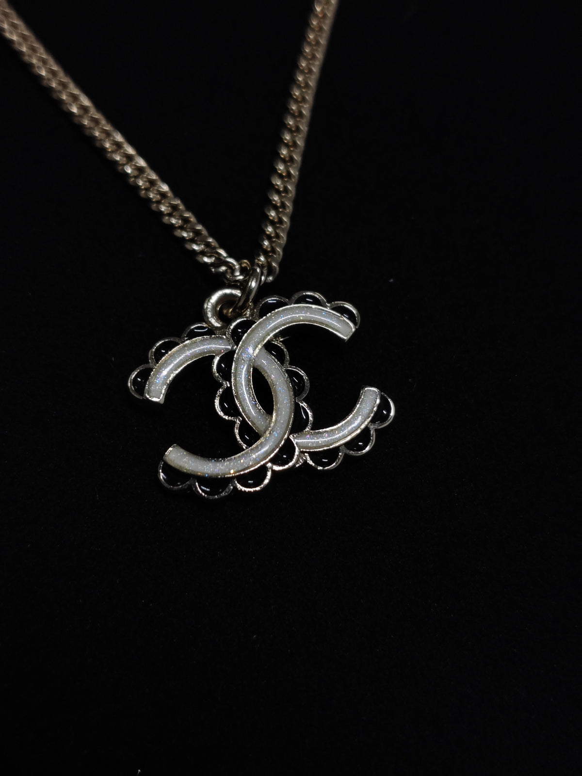 Chanel - Other - Gold-tone metal with white and black decorative accents - Gold
