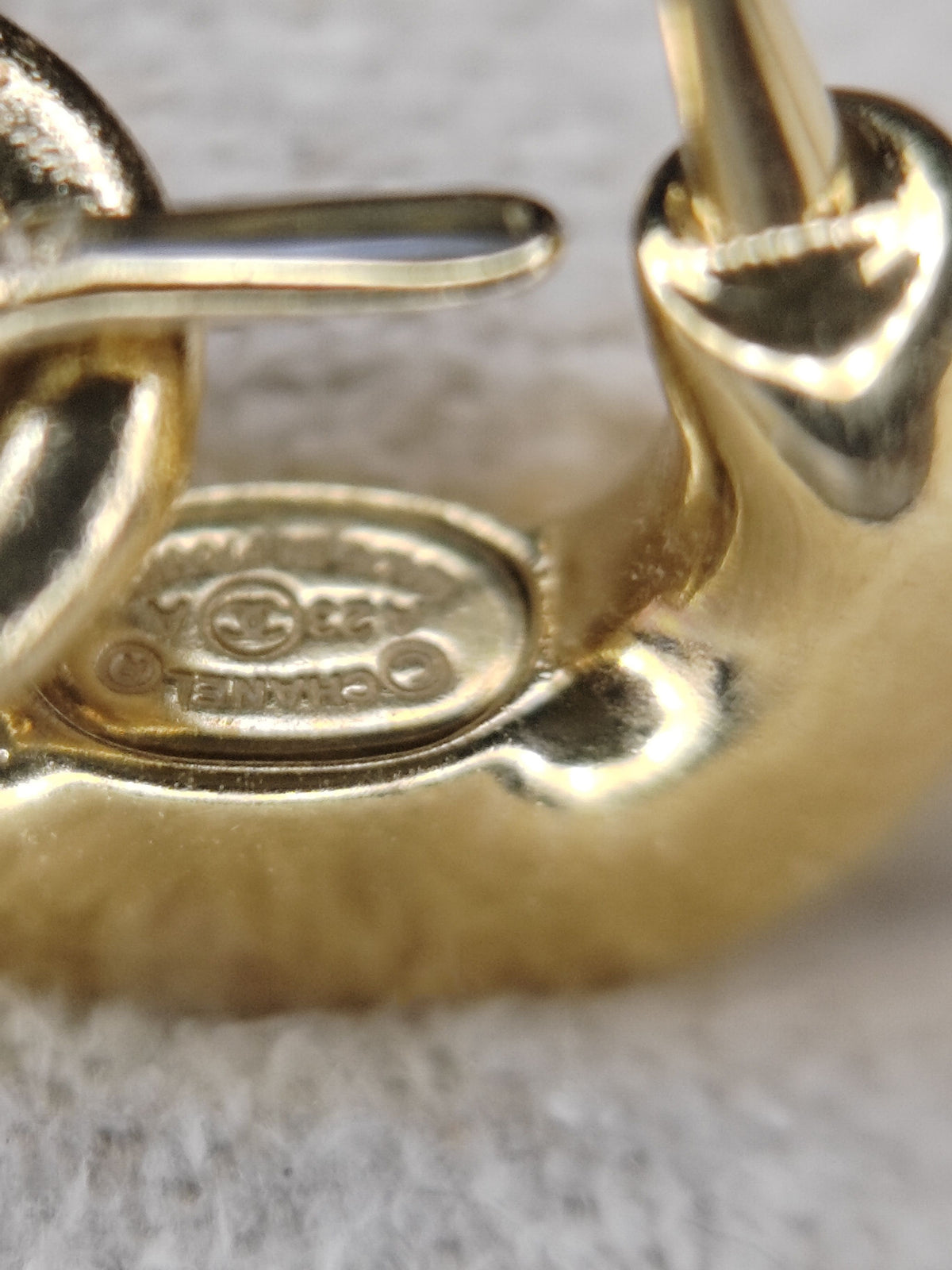 Chanel - Other - Gold-tone metal with white enamel detailing; exact composition is unverified. - Multicolour