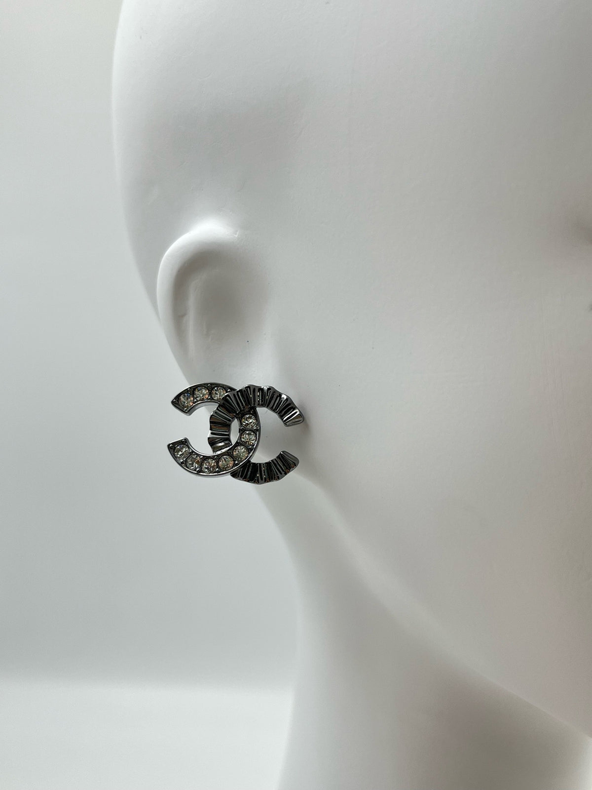 Chanel - Other - Gunmetal-tone metal with clear glass crystals. - Grey