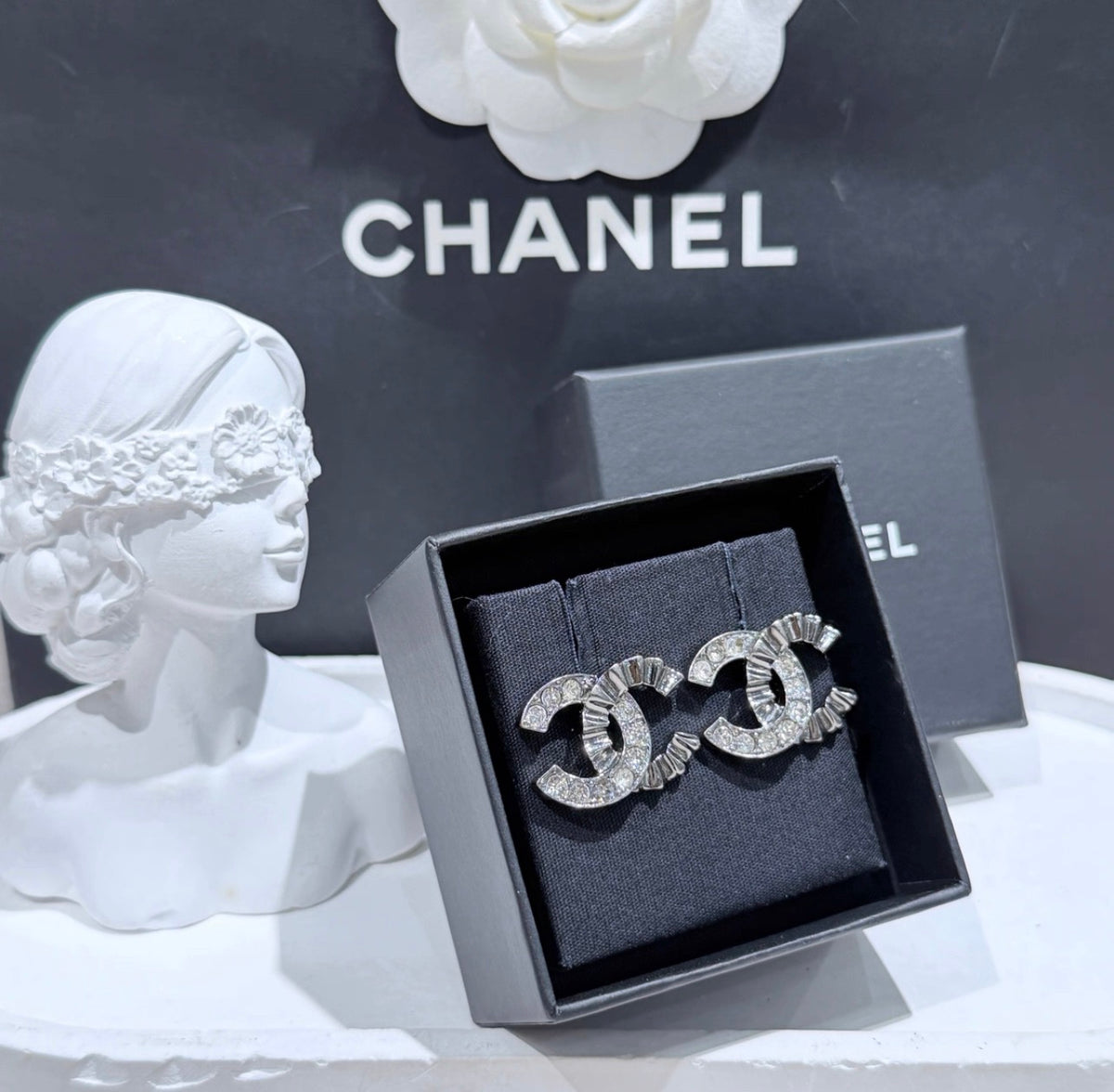 Chanel - Other - Gunmetal-tone metal with clear glass crystals. - Grey