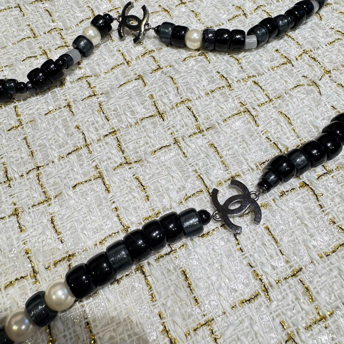 Chanel - Other - Metal alloy findings with black and grey beads and pearl-like beads; exact bead compositions are unconfirmed. - Multicolour - (120 cm)