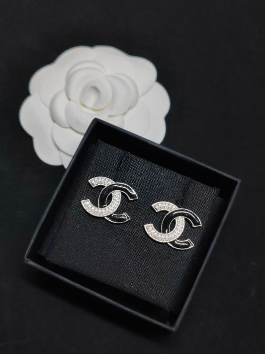 Chanel - Other - Metal alloy with black enamel and crystal embellishments. - Multicolour