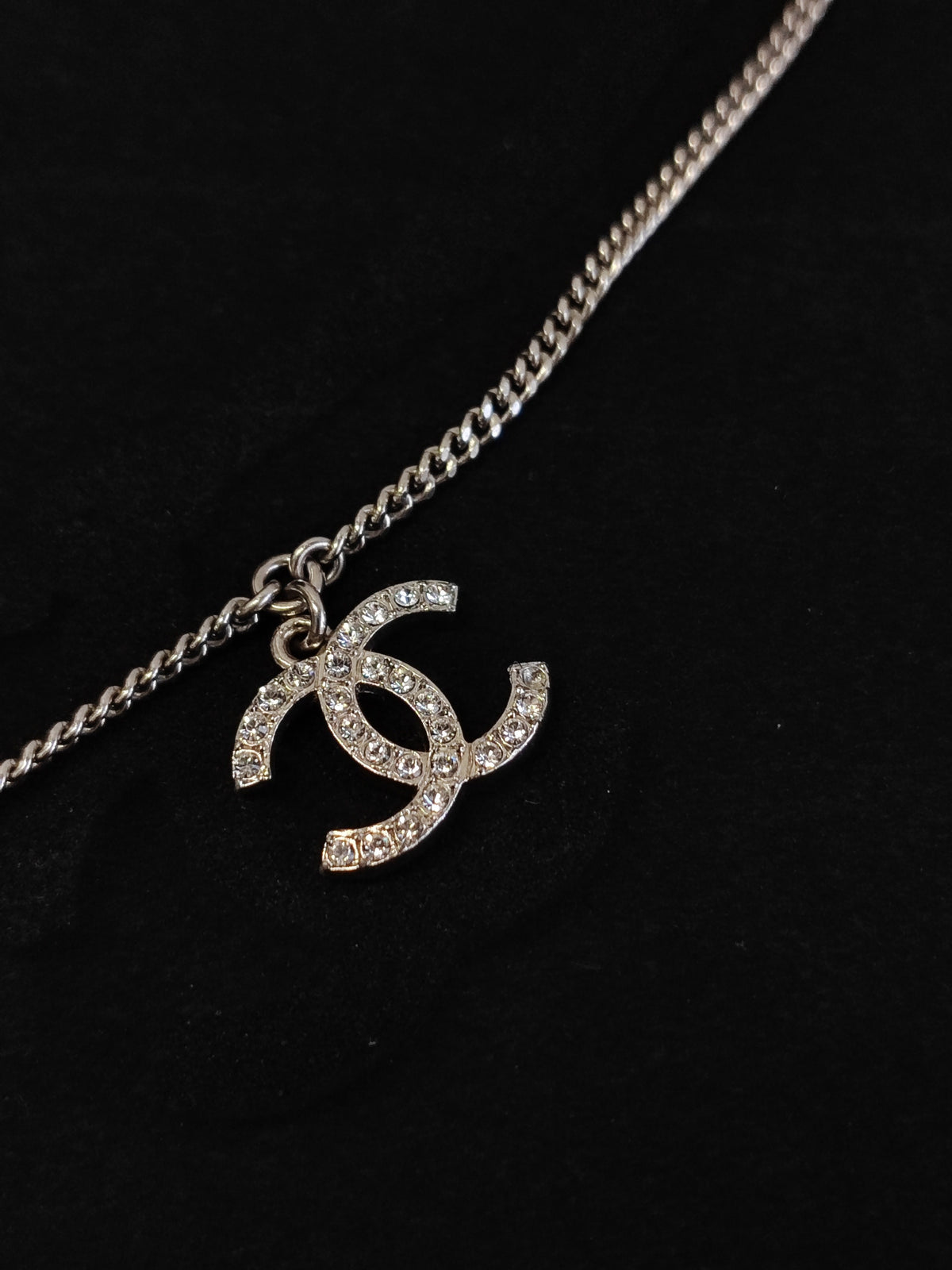 Chanel - Other - Metal alloy with glass crystals and a pearl accent; exact composition is not confirmed. - Silver
