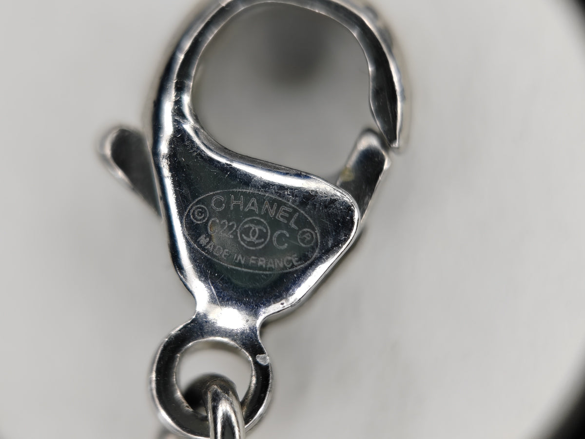 Chanel - Other - Metal alloy with glass crystals and a pearl accent; exact composition is not confirmed. - Silver