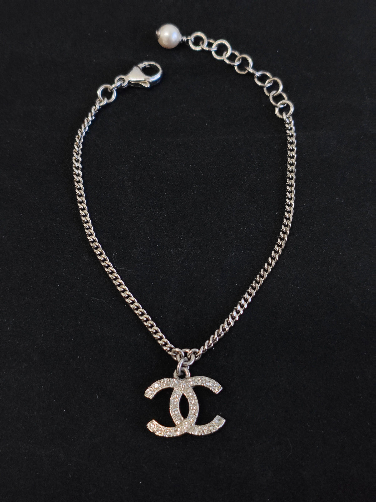 Chanel - Other - Metal alloy with glass crystals and a pearl accent; exact composition is not confirmed. - Silver