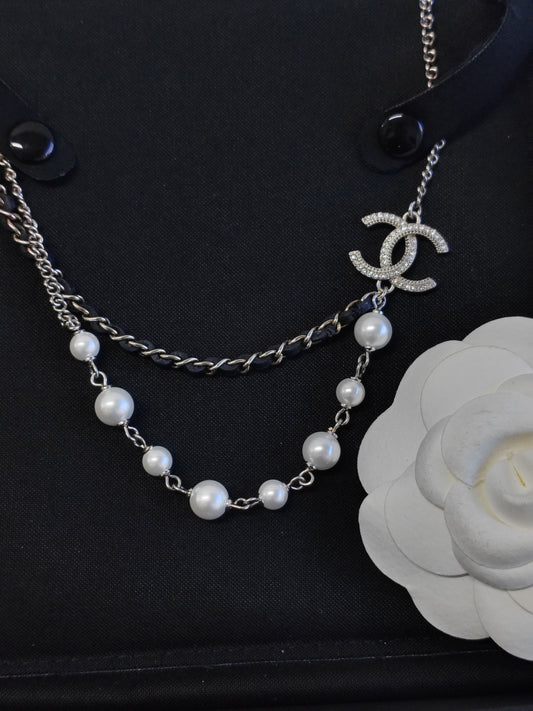 Chanel - Other - Metal chain with faux pearl beads, crystal-like embellishments and leather-threaded links. - Multicolour