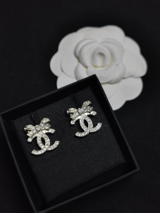 Chanel - Other - Metal setting with rhinestone embellishment; exact alloy unspecified. - Silver