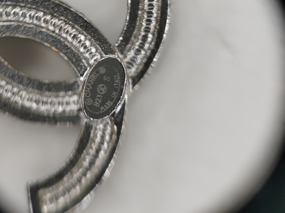 Chanel - Other - Metal setting with rhinestone embellishment; exact alloy unspecified. - Silver