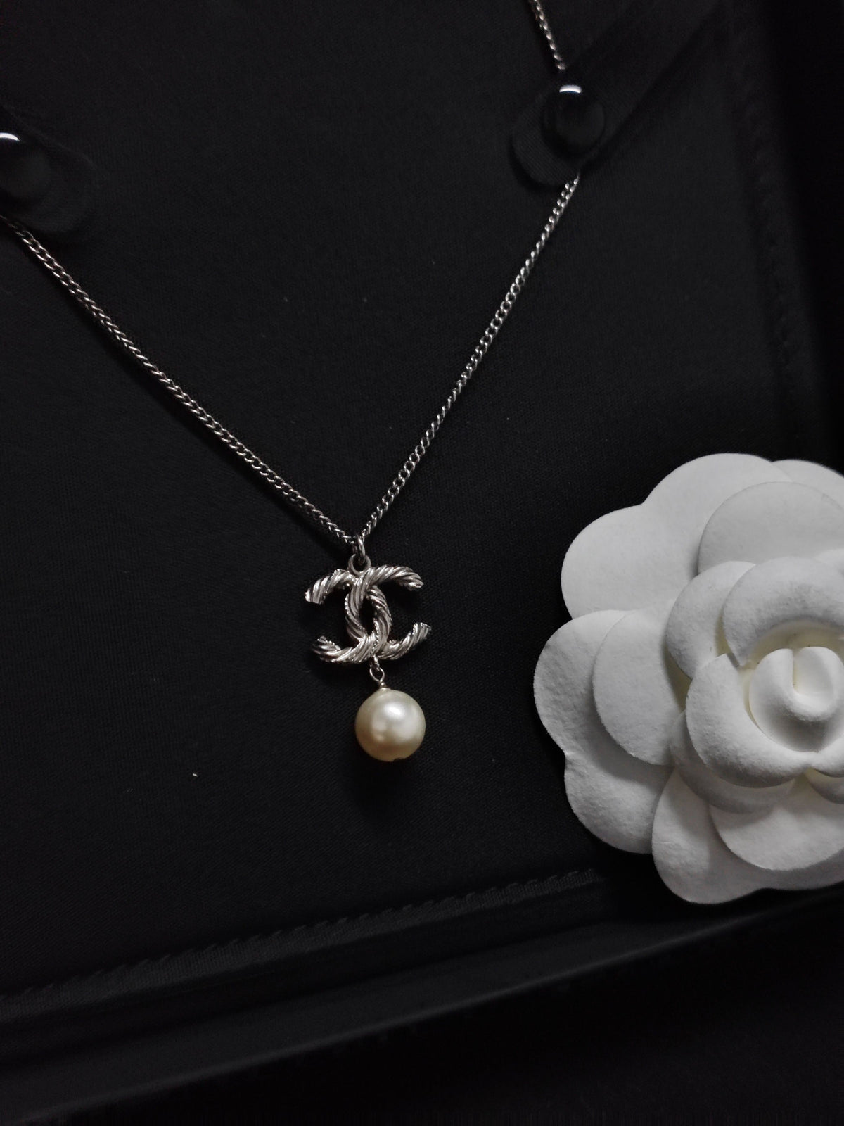 Chanel - Other - Metal with clear crystal accents and a pearl drop; exact pearl composition is unknown. - Silver