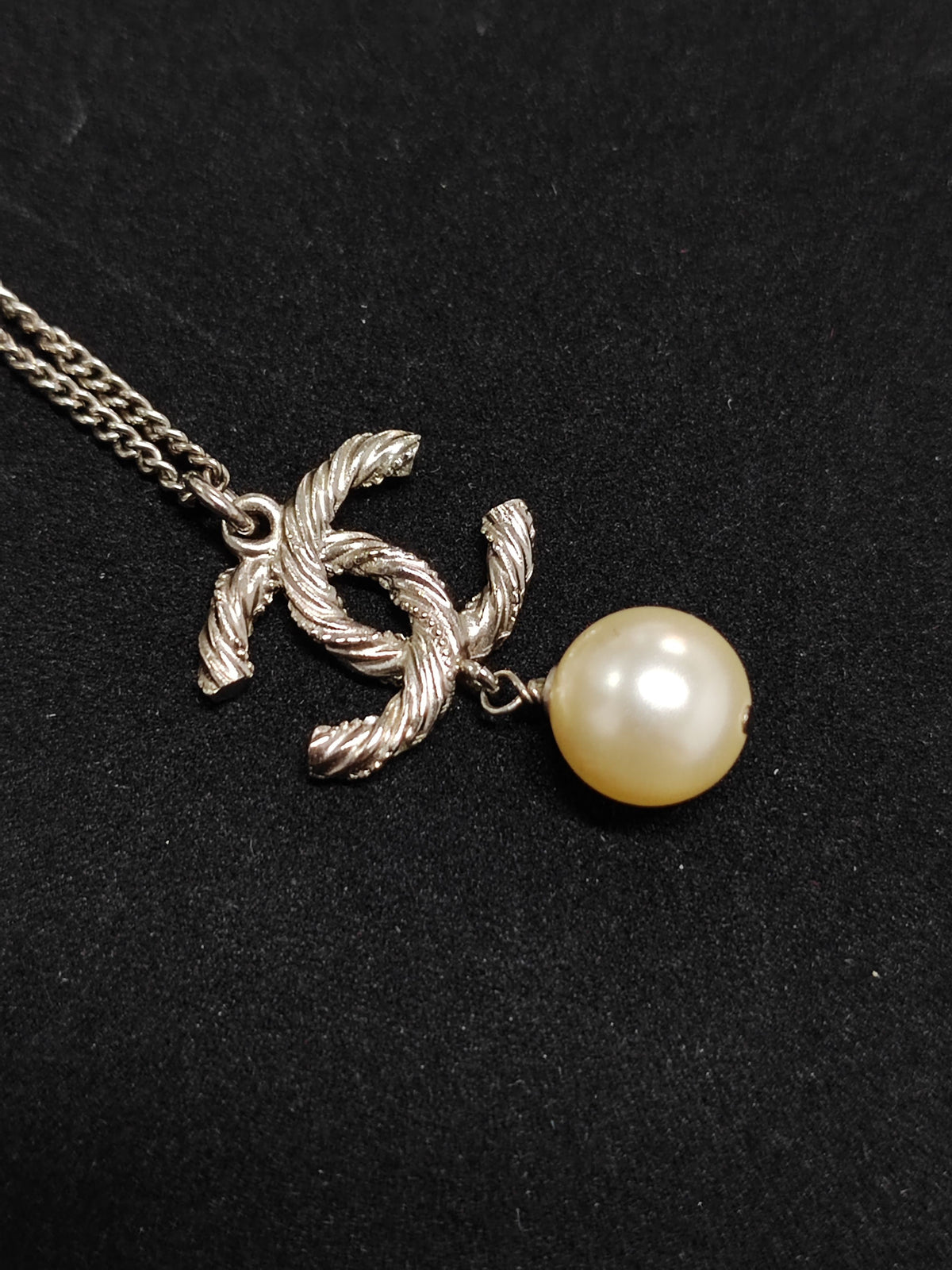 Chanel - Other - Metal with clear crystal accents and a pearl drop; exact pearl composition is unknown. - Silver