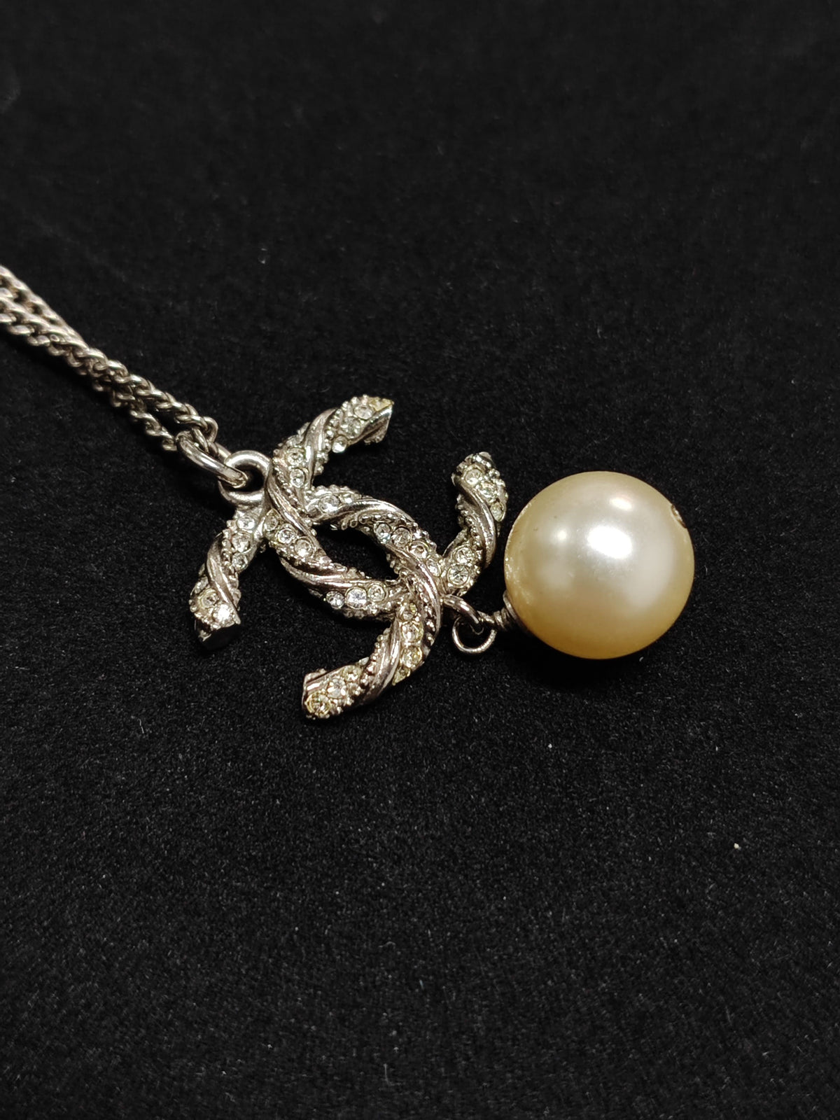 Chanel - Other - Metal with clear crystal accents and a pearl drop; exact pearl composition is unknown. - Silver