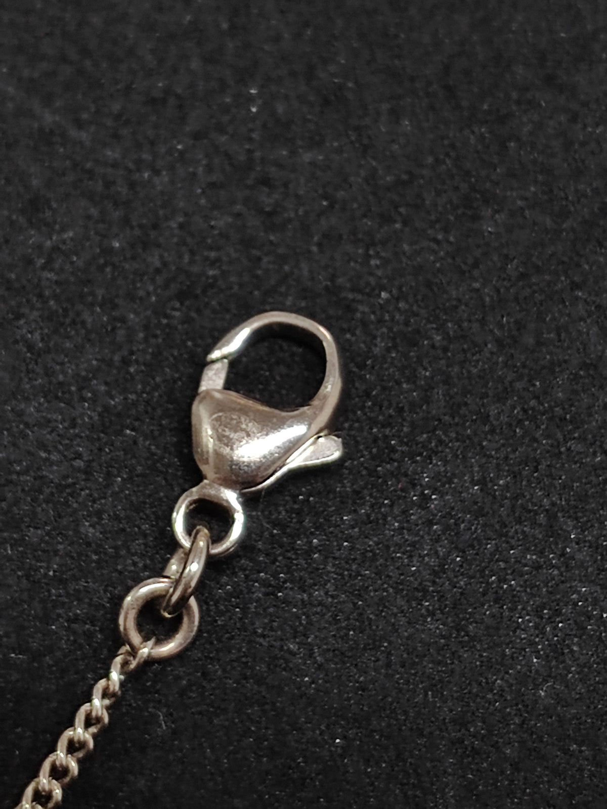Chanel - Other - Metal with clear crystal accents and a pearl drop; exact pearl composition is unknown. - Silver