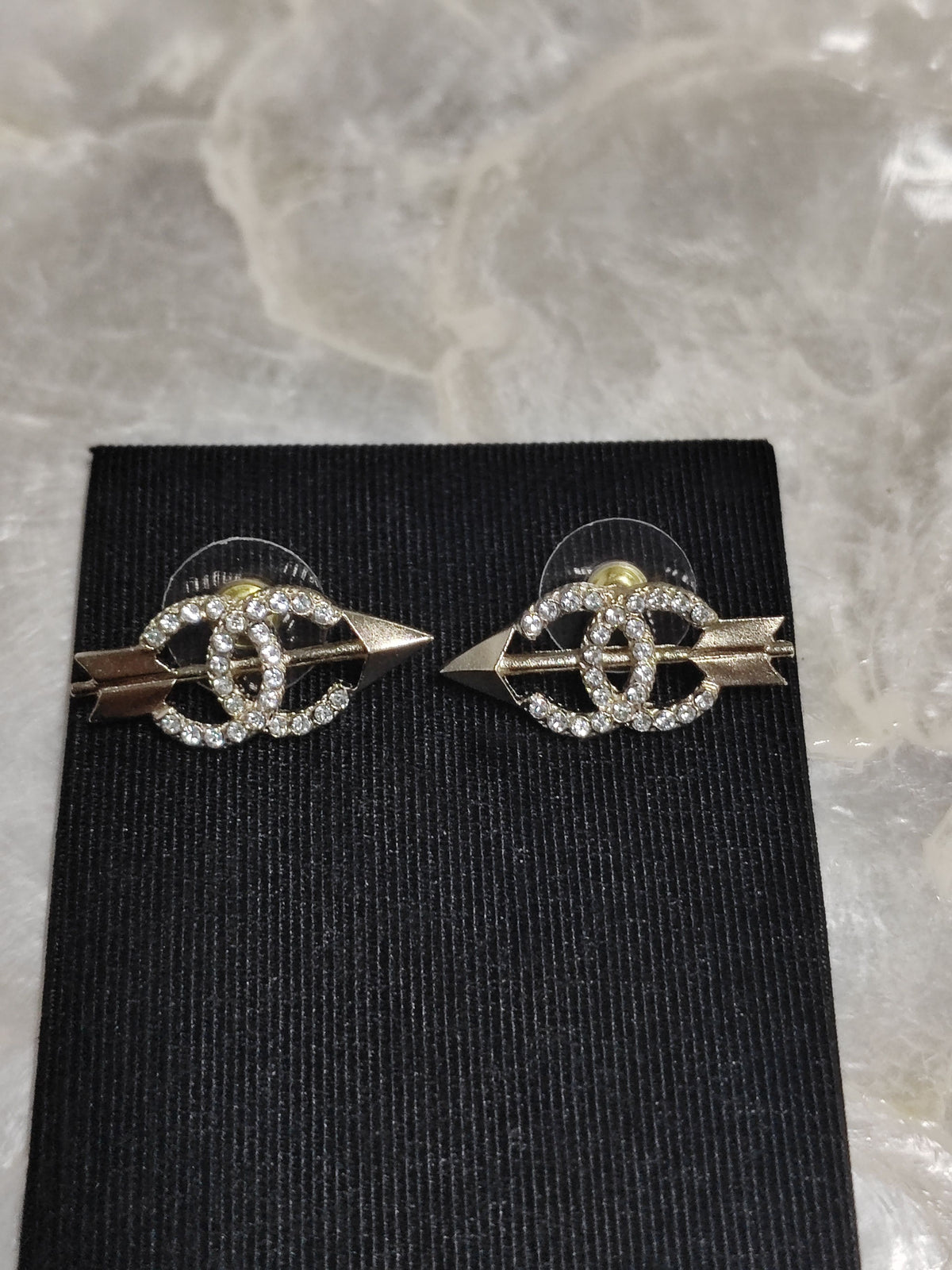 Chanel - Other - Metal with clear rhinestone embellishments; exact composition is unverified. - Silver