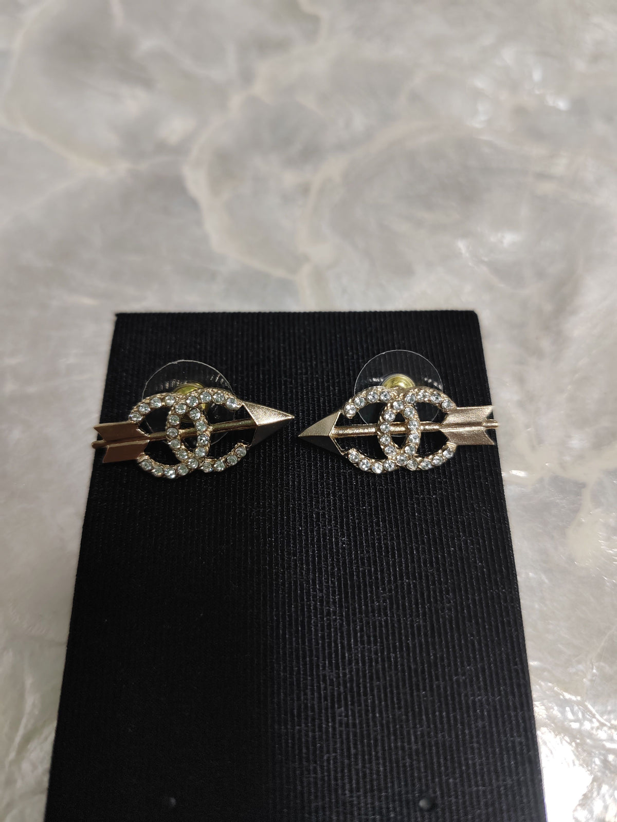 Chanel - Other - Metal with clear rhinestone embellishments; exact composition is unverified. - Silver