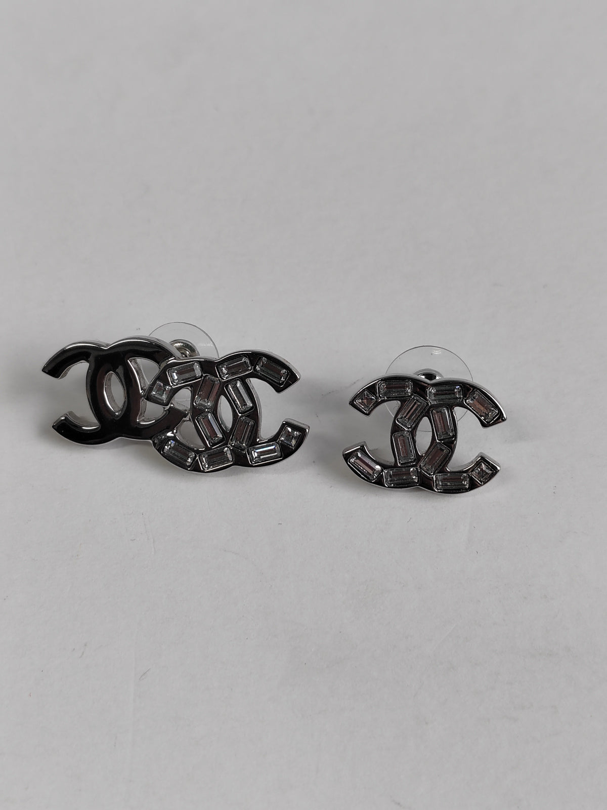 Chanel - Other - Metal with glass rhinestones; composition is not confirmed for this pair. - Silver