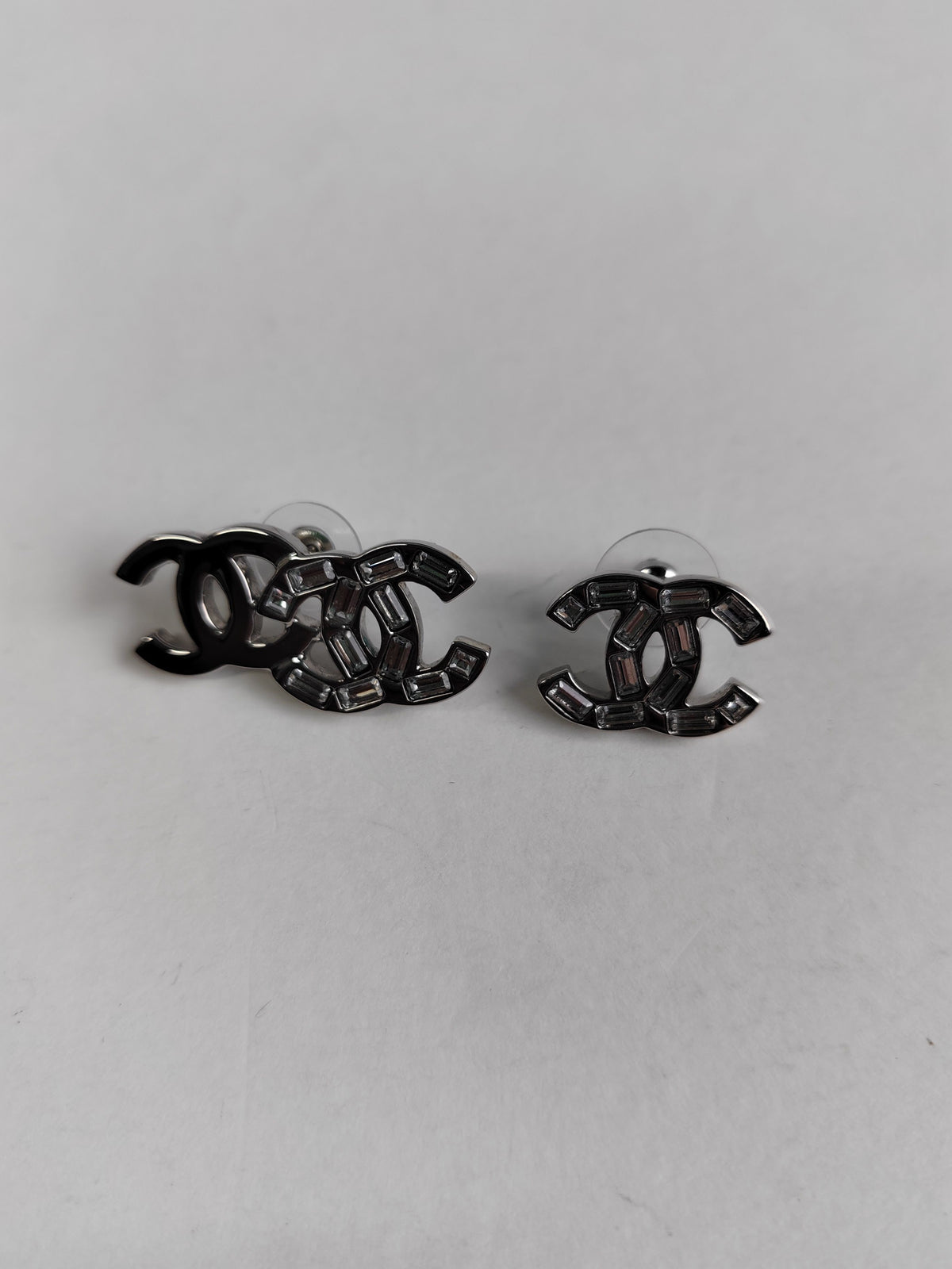 Chanel - Other - Metal with glass rhinestones; composition is not confirmed for this pair. - Silver