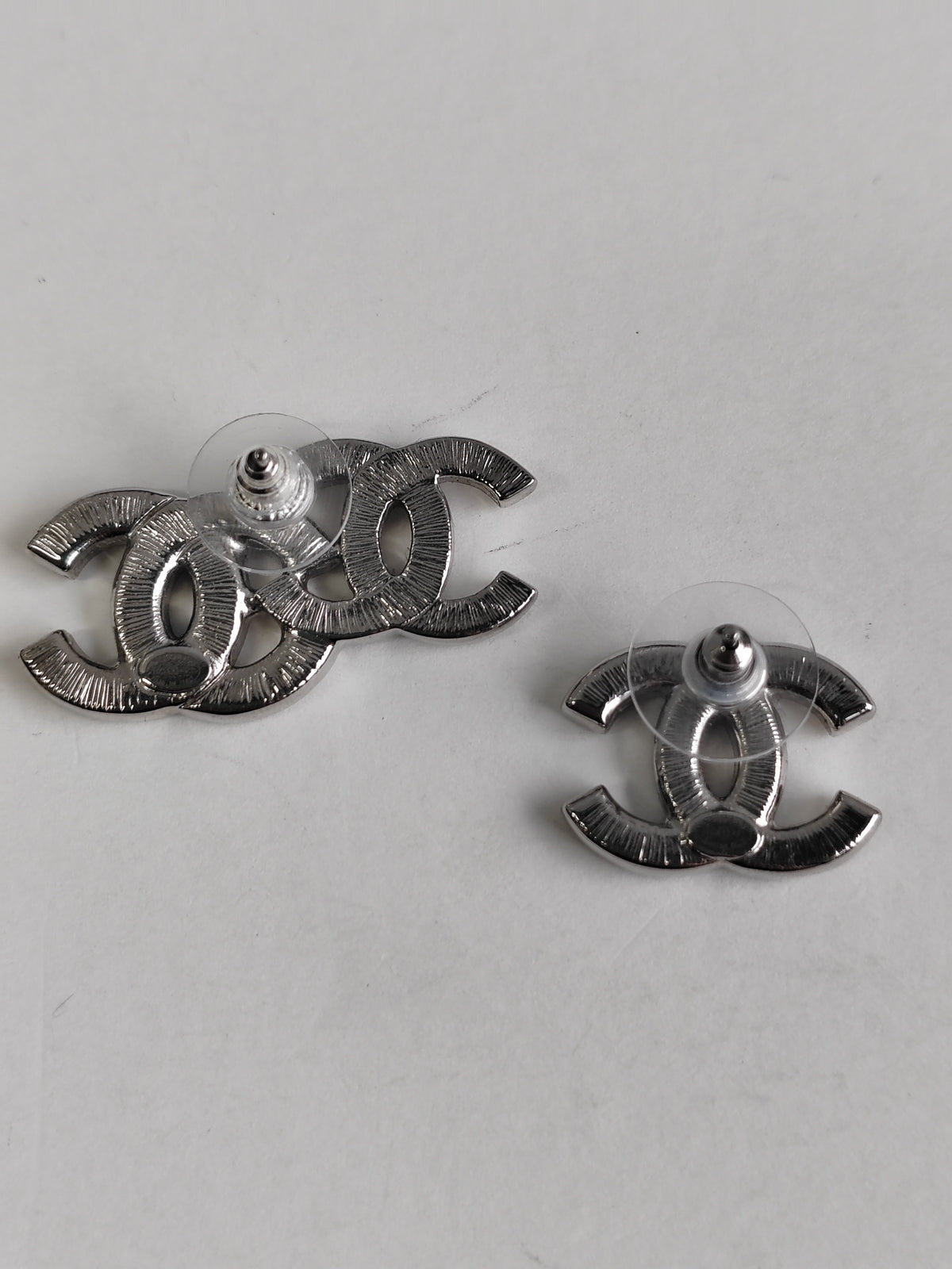 Chanel - Other - Metal with glass rhinestones; composition is not confirmed for this pair. - Silver
