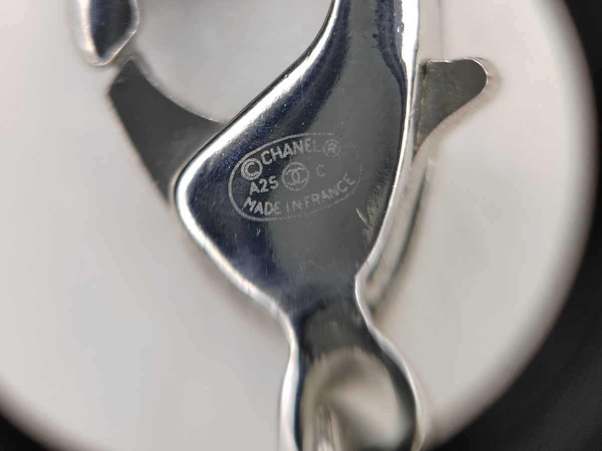 Chanel - Other - Silver-tone base metal with imitation pearls and clear rhinestones. - Silver