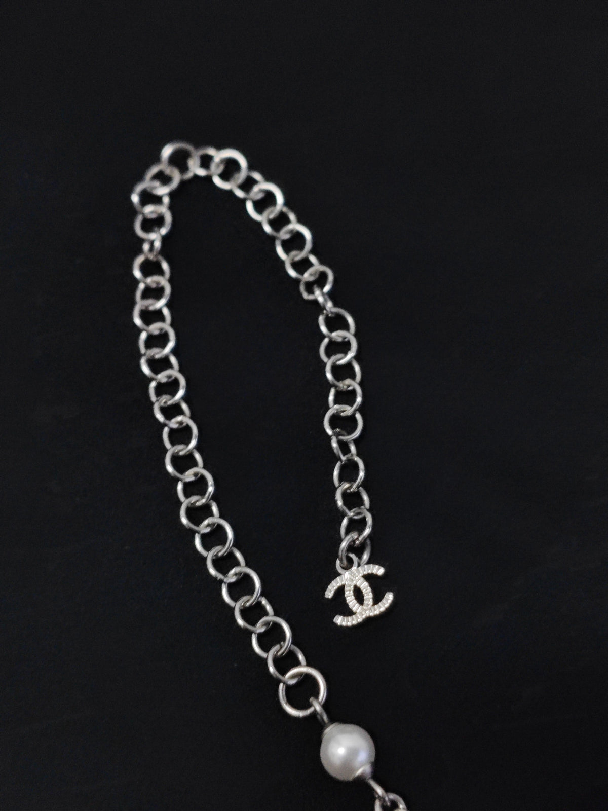Chanel - Other - Silver-tone base metal with imitation pearls and clear rhinestones. - Silver