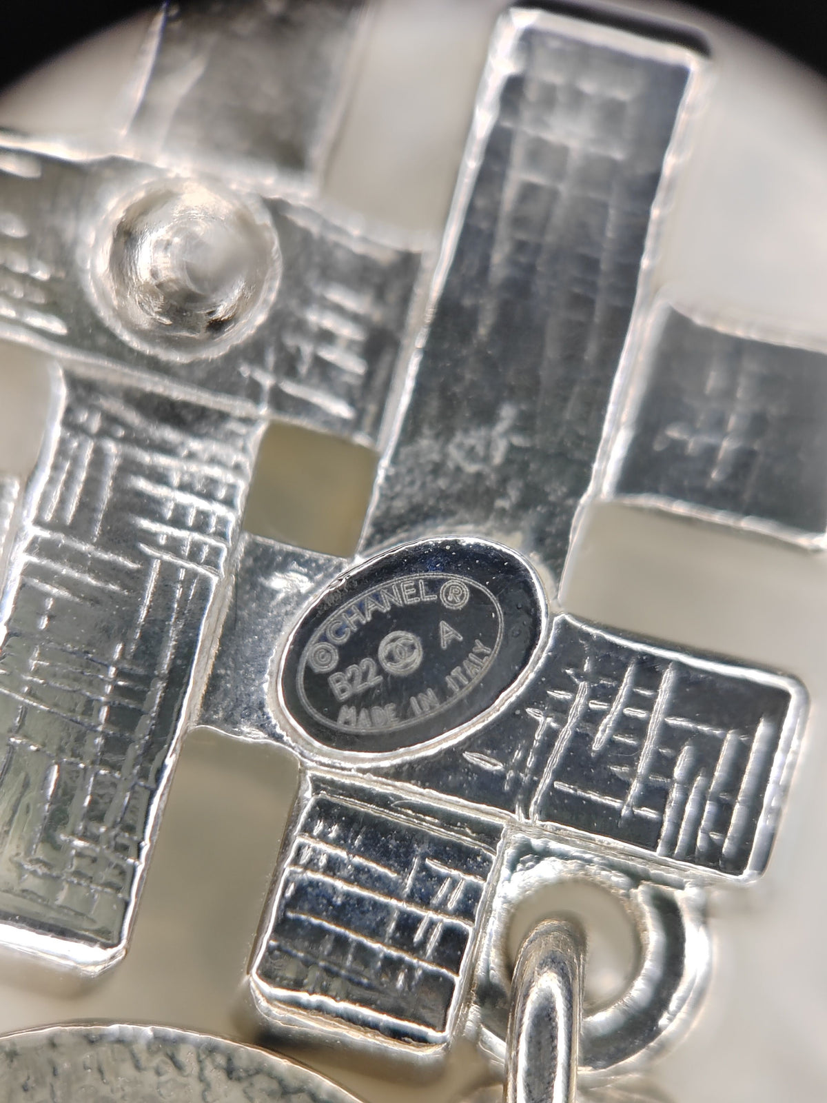 Chanel - Other - Silver-tone metal with clear and black rhinestone accents. - Multicolour