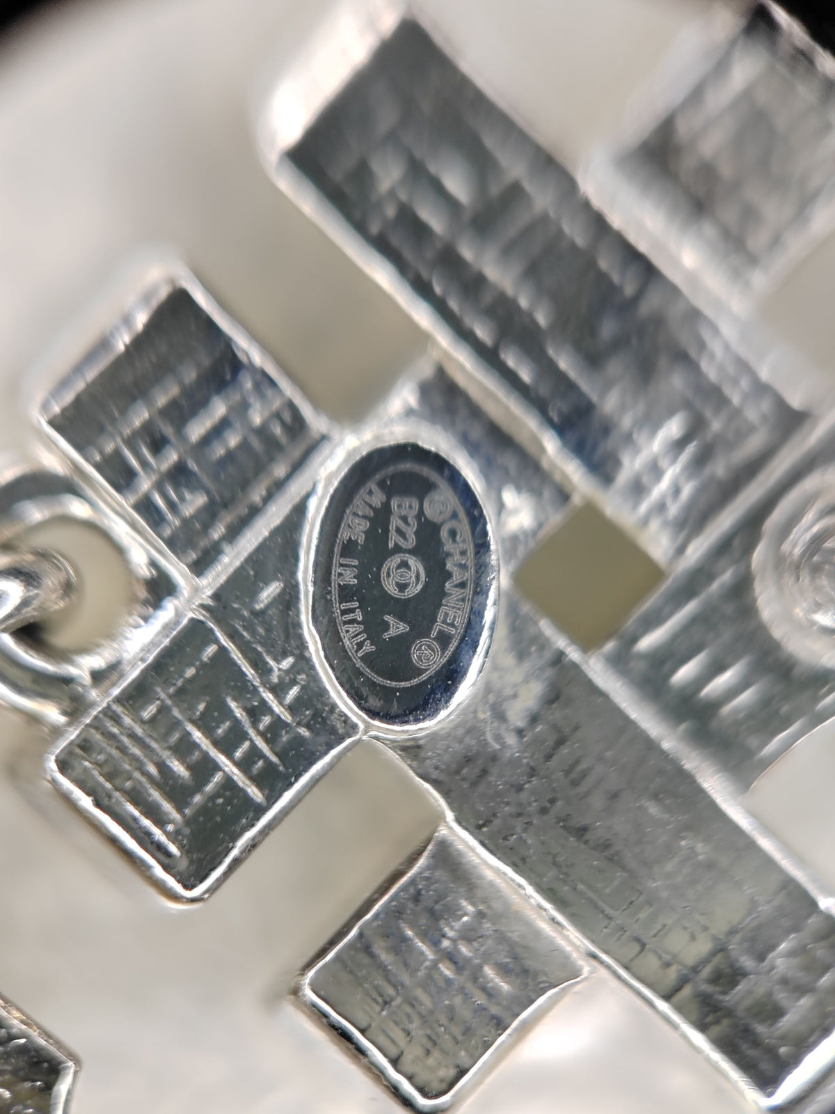 Chanel - Other - Silver-tone metal with clear and black rhinestone accents. - Multicolour