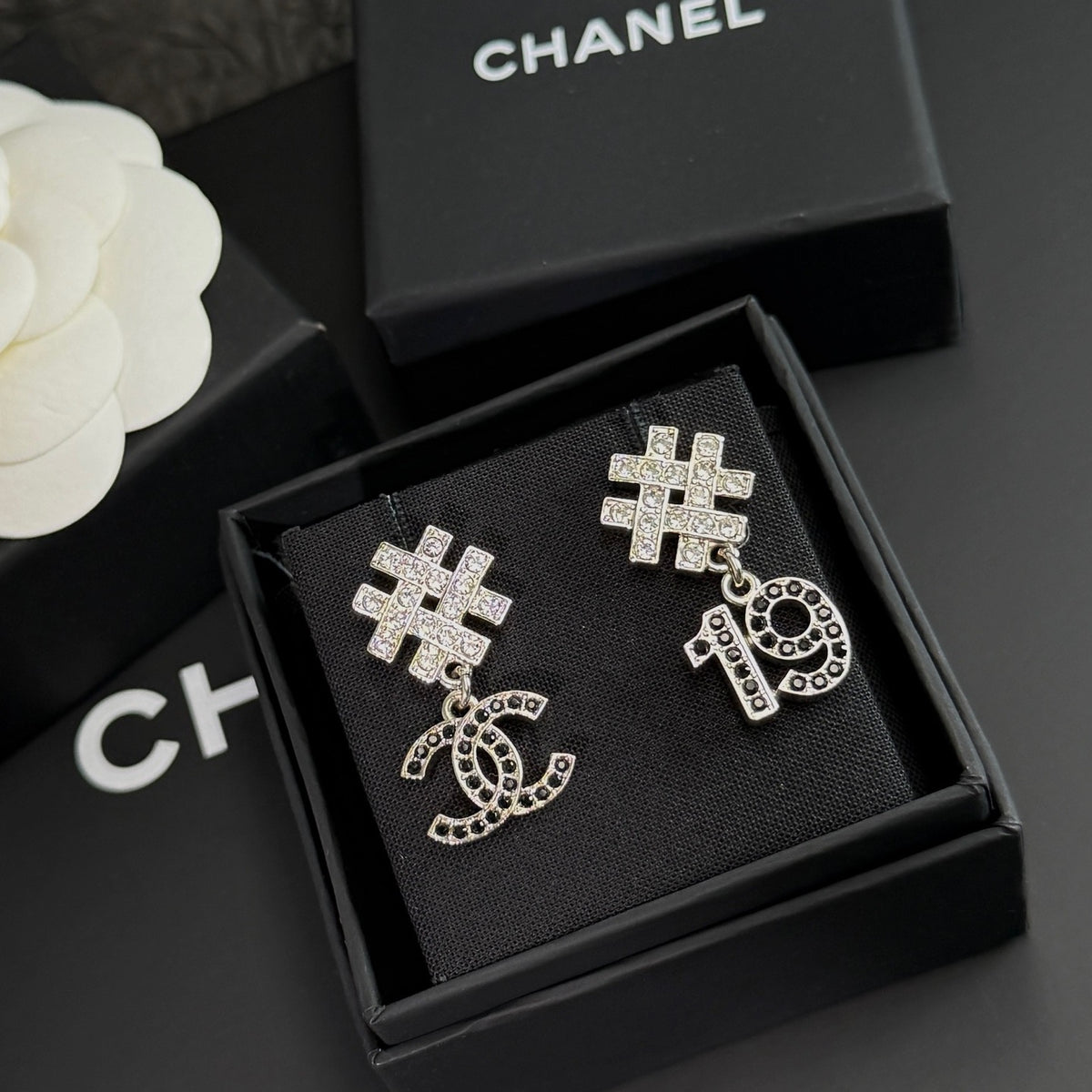 Chanel - Other - Silver-tone metal with clear and black rhinestone embellishments. - Silver