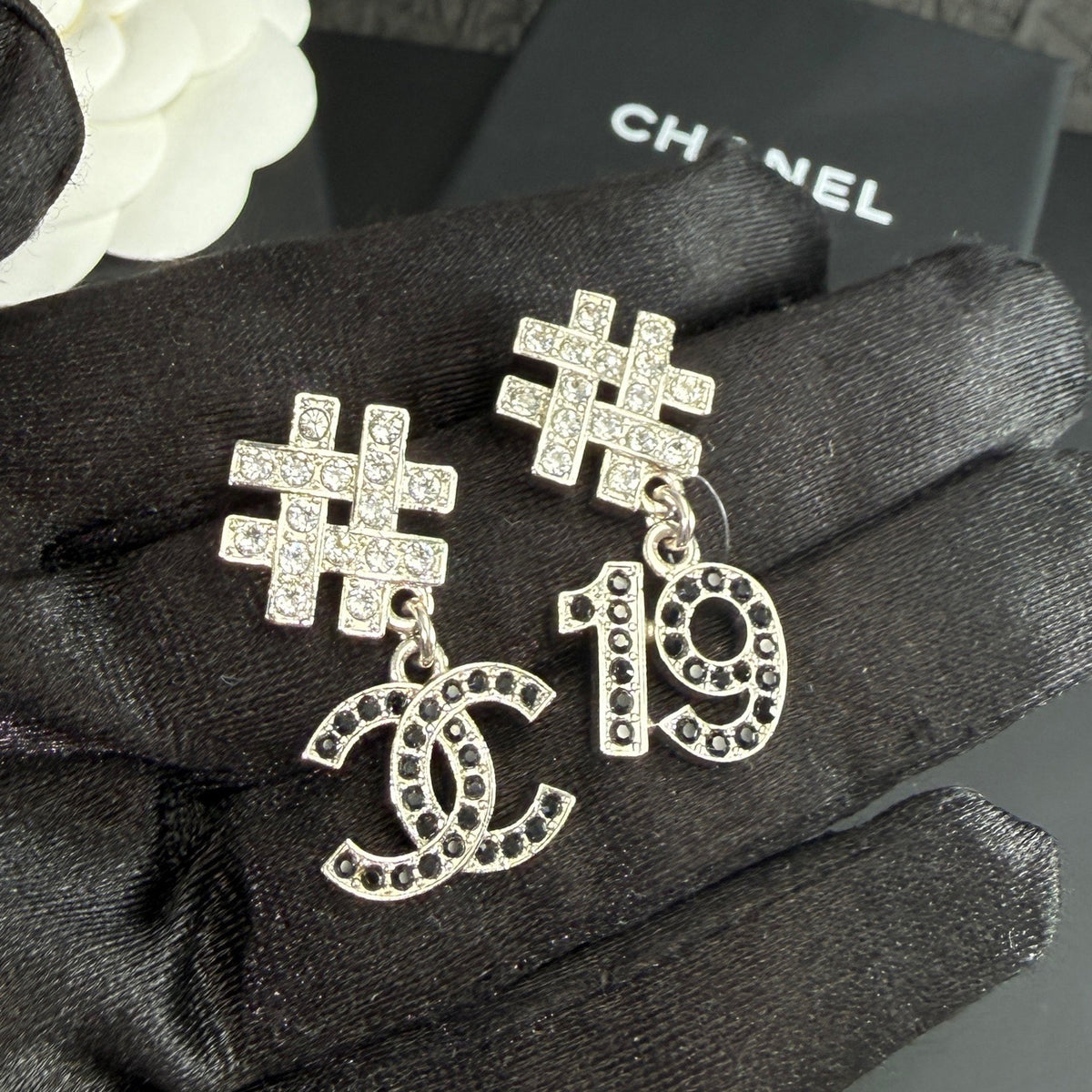 Chanel - Other - Silver-tone metal with clear and black rhinestone embellishments. - Silver