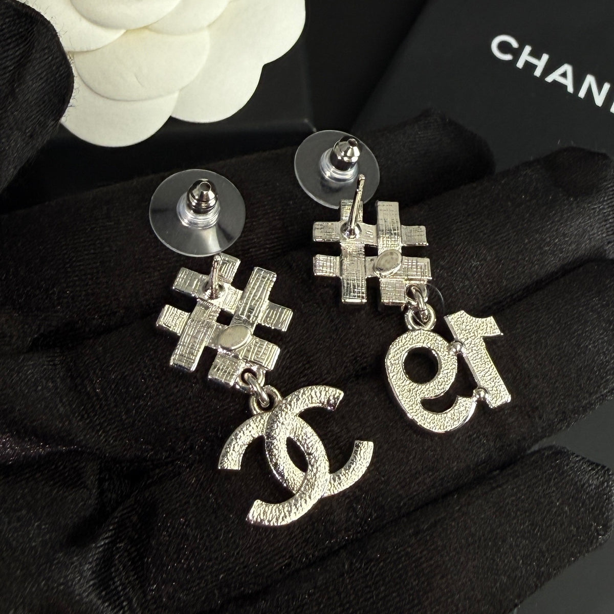 Chanel - Other - Silver-tone metal with clear and black rhinestone embellishments. - Silver