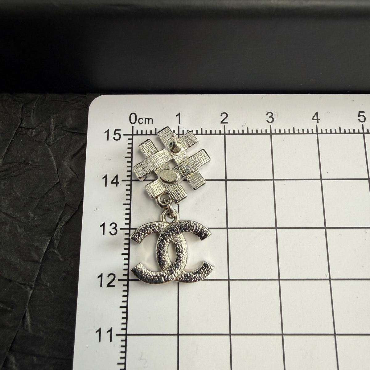Chanel - Other - Silver-tone metal with clear and black rhinestone embellishments. - Silver