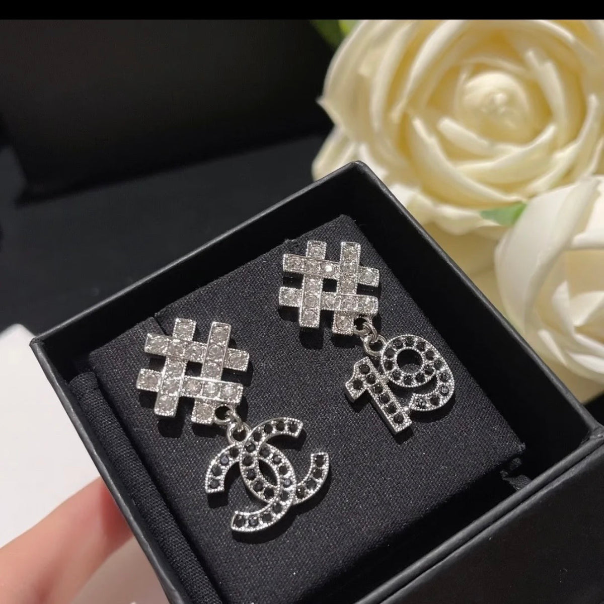 Chanel - Other - Silver-tone metal with clear and black rhinestone embellishments. - Silver