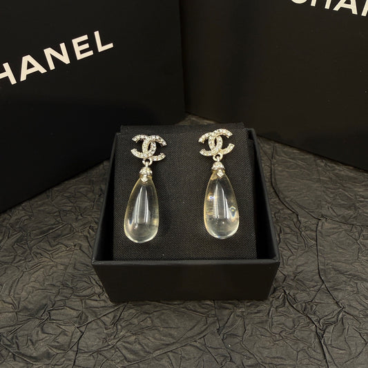 Chanel - Other - Silver-tone metal with clear crystal embellishments. - Silver