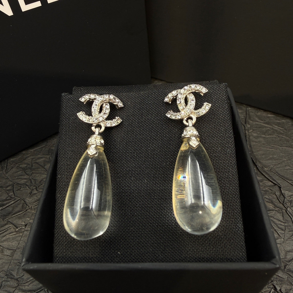 Chanel - Other - Silver-tone metal with clear crystal embellishments. - Silver