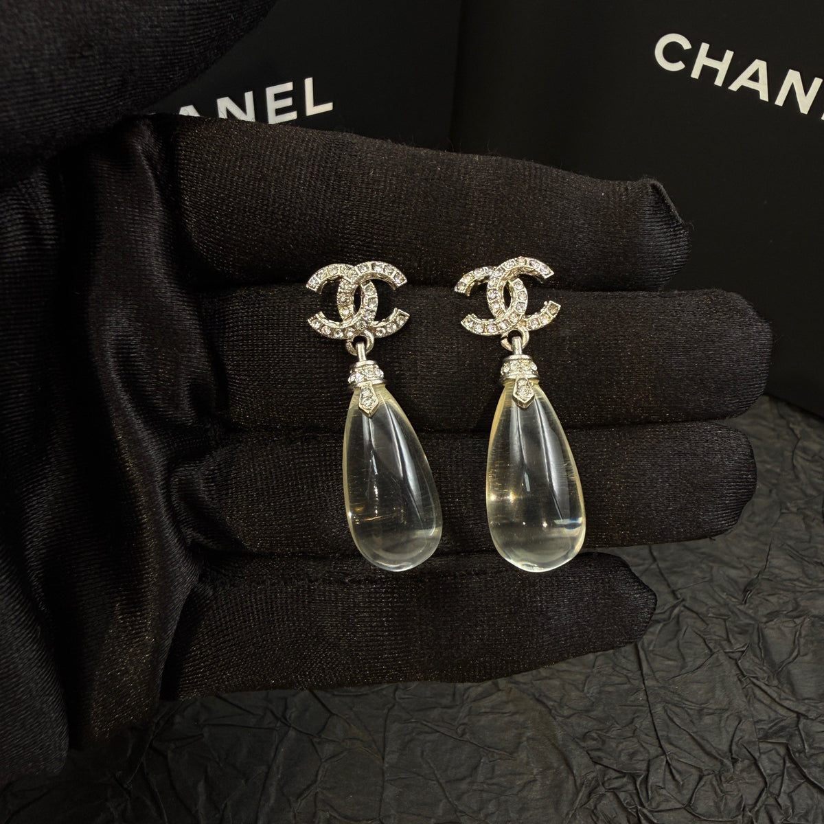Chanel - Other - Silver-tone metal with clear crystal embellishments. - Silver