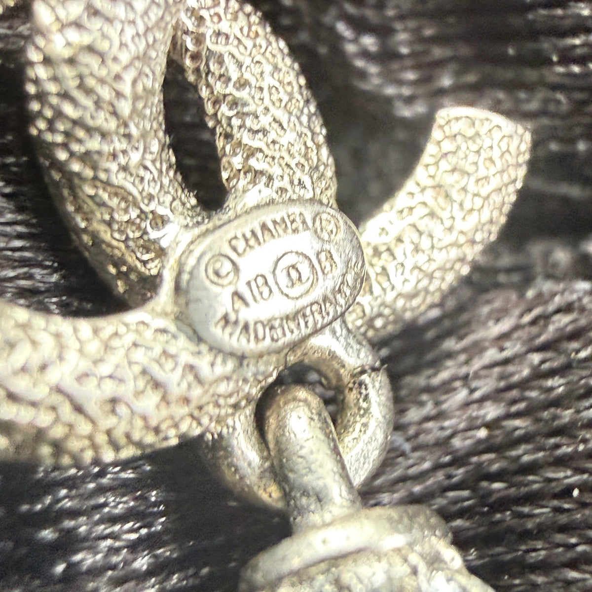 Chanel - Other - Silver-tone metal with clear crystal embellishments. - Silver