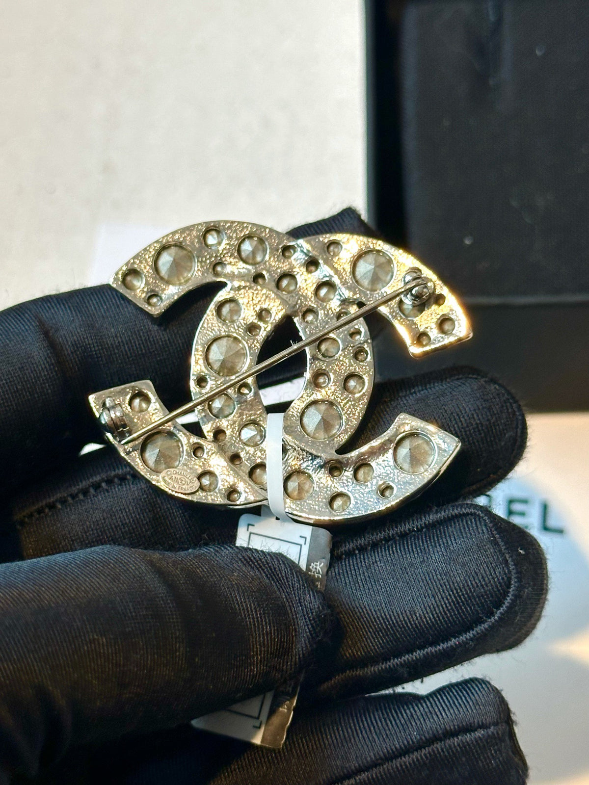 Chanel - Other - Silver-tone metal with clear glass crystals. - Silver