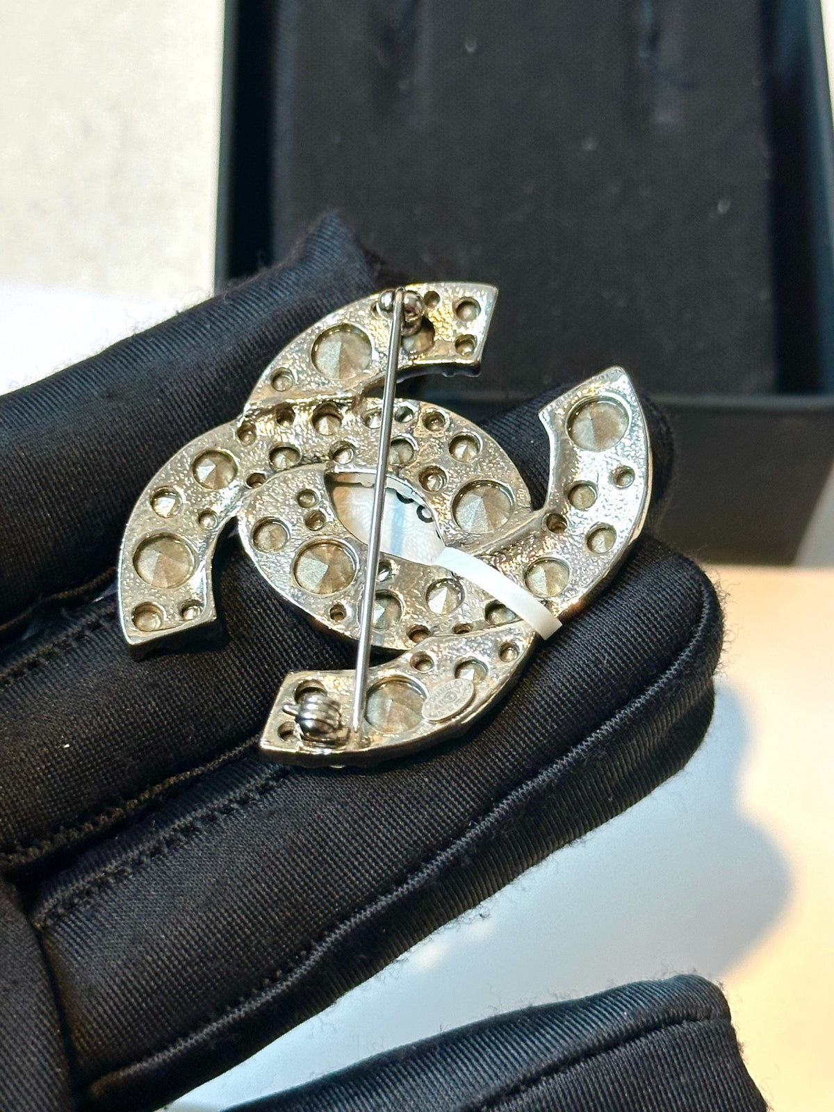 Chanel - Other - Silver-tone metal with clear glass crystals. - Silver