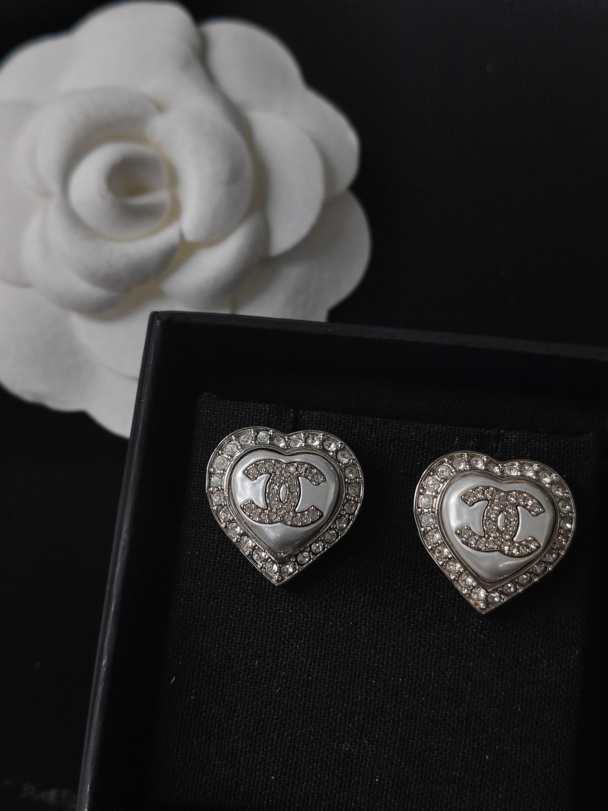 Chanel - Other - Silver-tone metal with clear rhinestone accents and a white heart-shaped inlay; exact composition unknown. - Silver