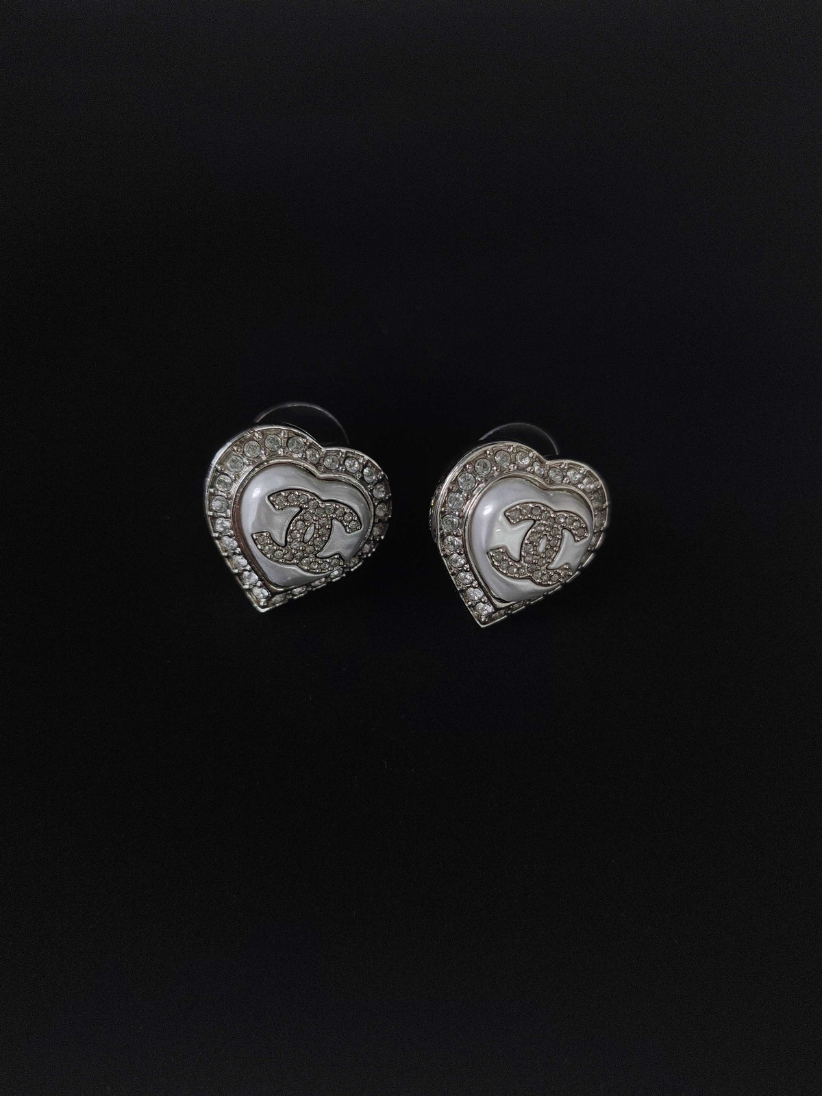 Chanel - Other - Silver-tone metal with clear rhinestone accents and a white heart-shaped inlay; exact composition unknown. - Silver